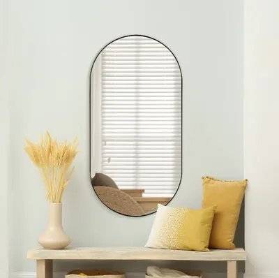 מראה מעוצבת קפסולה אובלית מסגרת מתכת שחורה-מידות לבחירה